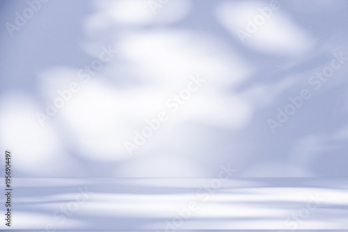 Wall interior background, studio and backdrops show products.with shadow from window color white and blue background for text insertion and presentation product	
