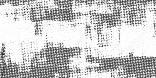 Abstract halftone texture featuring a dynamic arrangement of dots forming geometric and organic shapes