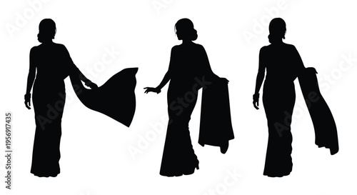 Three women in traditional indian dress a striking black silhouette