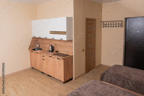 Fotografie Modern interior of a compact studio hotel room