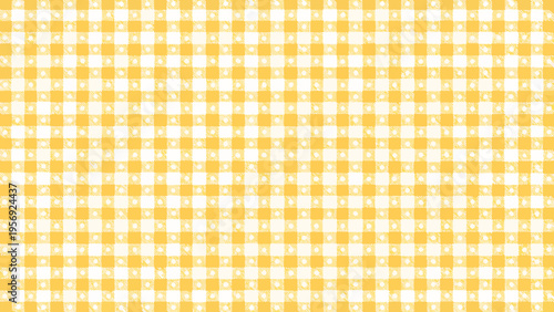 A bright yellow and white gingham pattern fills the entire frame