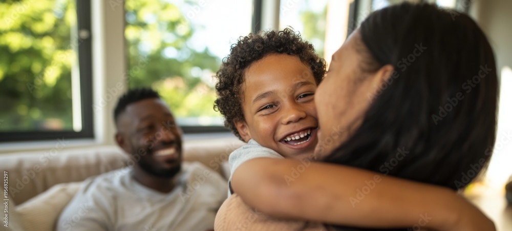 Obraz premium Family Hugging in Living Room, Smiling Child with Parents