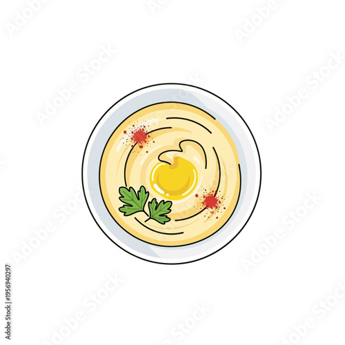 Top view of creamy hummus with olive oil, paprika and parsley garnish