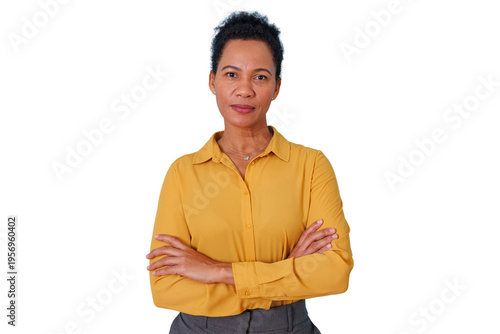 Middle-aged black woman expressing confidence and professionalism, wearing a yellow shirt, with a neutral expression