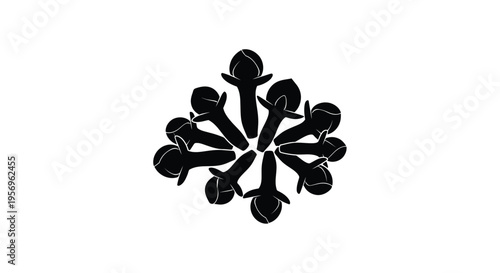 A cluster of cloves displayed in a striking black silhouette