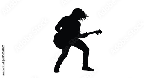 Musician playing electric guitar in a dynamic dark silhouette