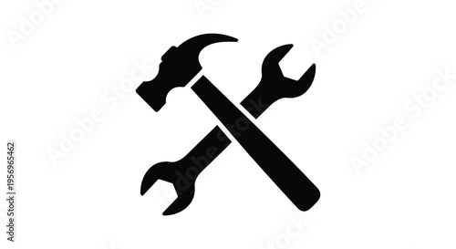 Crossed hammer and wrench tools depicted in a dark silhouette