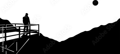 Vector silhouette of man on mountain platform at sunset