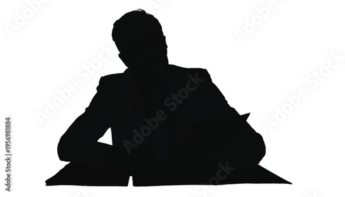 Businessman silhouette sits contemplating while looking down at a flat surface, isolated on white background.