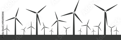 Multiple black and white wind turbines standing on a flat landscape background