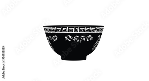 Ornate black bowl with geometric and floral designs a striking silhouette