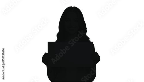 Female silhouette holding a blank rectangular sign or tablet directly in front of her body.