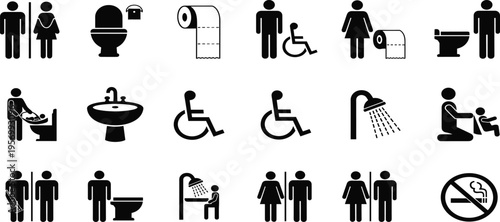 Restroom signs display various toilet and bathroom symbols for accessibility.