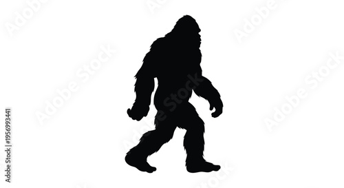 A dark full body silhouette of a mythical bigfoot creature silhouette