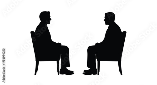 Two men in chairs facing each other a striking silhouette