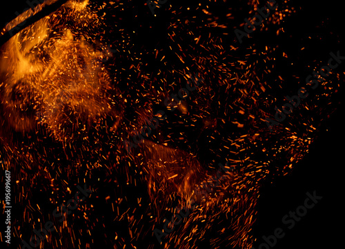 A black background with a lot of fire and smoke