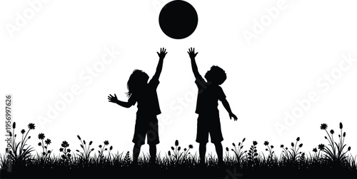 Silhouette of two happy children playing with a ball in a flower meadow at sunset, childhood joy and outdoor summer activity