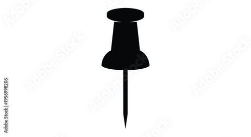 A black push pin displayed against a white background a stark silhouette