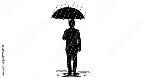 Person with umbrella standing in rain dramatic black silhouette