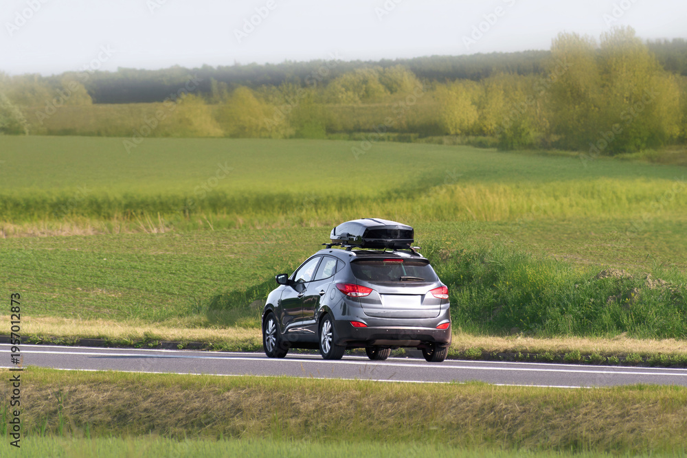 Fototapeta premium Exploring countryside by car with extra baggage space