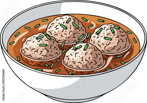 Delicious Meatballs in Savory Broth Garnished with Herbs.