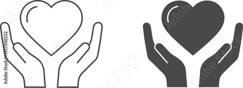 Pair of hands gently cradling a large heart symbol represents concepts of care, charity, or heartfelt emotion.