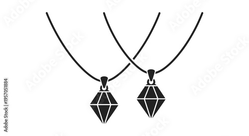 Two diamond pendants on chains a striking black silhouette