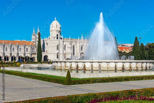 The magnificent Jeronimos Monastery under a blue sky in Lisbon, Portugal.