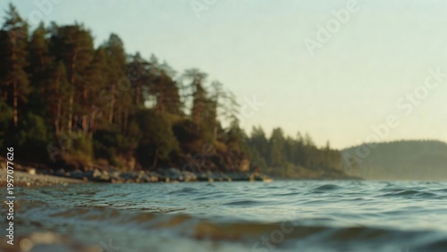 Serene Coastal Landscape with Gentle Waves and Lush Pine Forest at Sunrise on a Peaceful Morning by the Ocean