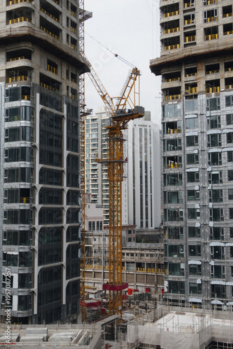 Vertical image of the construction process of a multi-story building