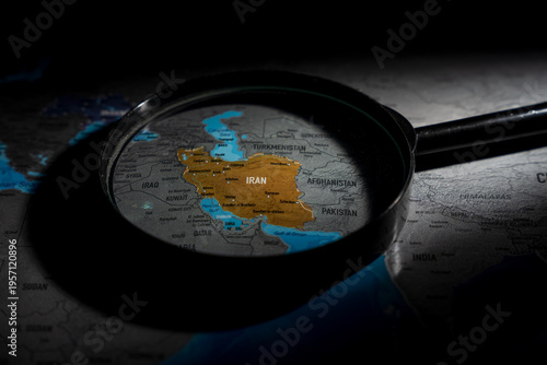 Magnifying glass focusing on Iran on a world map, representing geopolitical investigation, Middle East research, and international political analysis