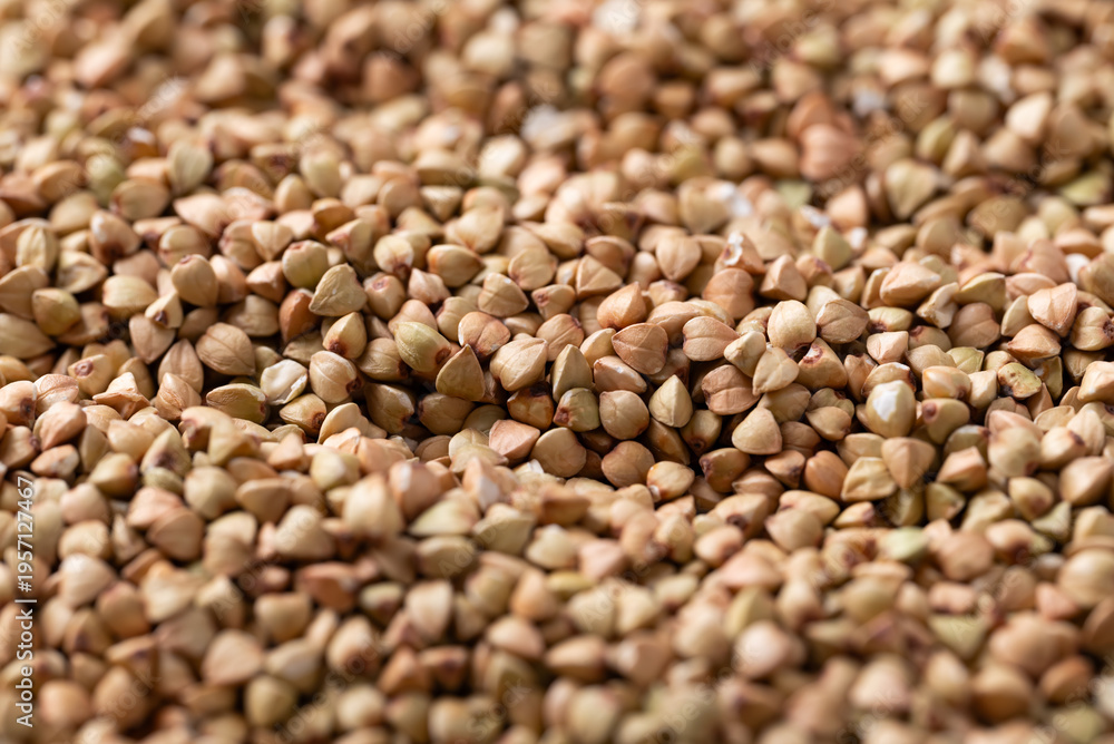 Fototapeta premium Raw organic buckwheat seed texture background, Food ingredients
