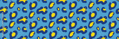 Blob animal glamour leopard pattern in bold blue and yellow. Freeform blob and rosette as modern vector on cobalt background. Trendy animalistic print with retro glam aesthetic for fashion apparel.