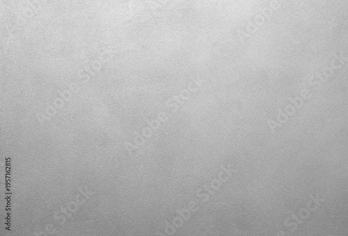 White gray wall with a rough texture. wall is covered in white paint. wall is not very smooth as white textured background web banner template page
