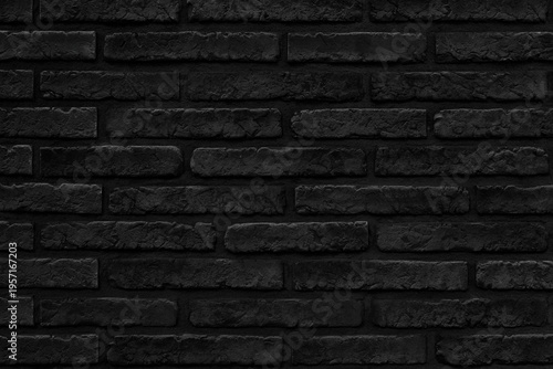 Dark brick wall with rough texture and aged look. Uniform rows display subtle wear and natural imperfections. Perfect background for moody, urban, or vintage themed projects