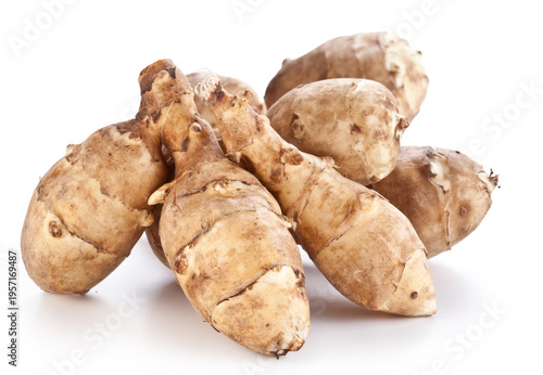 Freshly harvested Jerusalem artichoke (sunchoke) tubers  isolated on a white background.