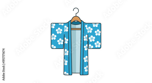 Blue kimono with white floral pattern hanging on a hanger.