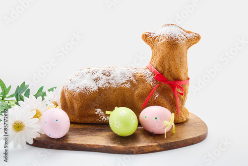 Easter lamb cake with decorative eggs and flowers