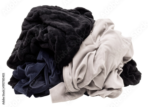 Various soft blankets are piled together on a clear background. The blankets show colors of black and gray, creating a layered look. This arrangement shows the texture of the fabrics