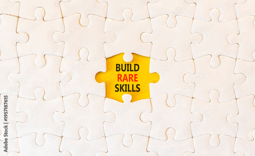 Fototapeta premium Build rare skills words symbol. Concept words Build rare skills on beautiful white puzzles. Beautiful yellow background. Business and build rare skills concept. Copy space.