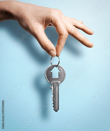 The realtor hands over the keys to the property to the new owner. Art collage.