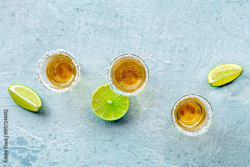 Wallpaper Mural Tequila shots with salted rims and lime slices, shot from the top Torontodigital.ca