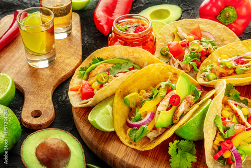 Wallpaper Mural Mexican food. Tacos, tequila, red salsa with ingredients, avocados and peppers Torontodigital.ca