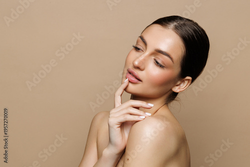 Portrait of young woman on beige background, space for text. Spa treatment