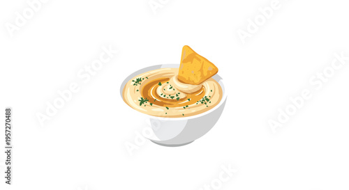 A white bowl of hummus garnished with herbs has a single tortilla chip dipped into its center on a white background.