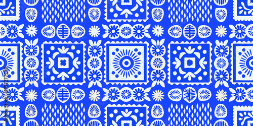 Intricate blue and white floral and geometric pattern repeating seamlessly