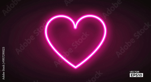 Vibrant pink neon heart glowing in the darkness, symbolizing love and romance