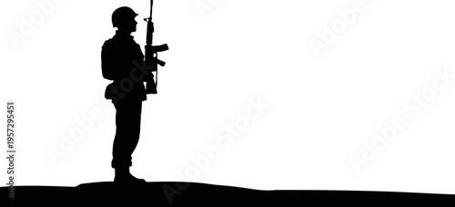 Silhouette of a soldier standing with a rifle on a horizon during a beautiful and dramatic sunset, symbolizing remembrance, duty, and sacrifice.