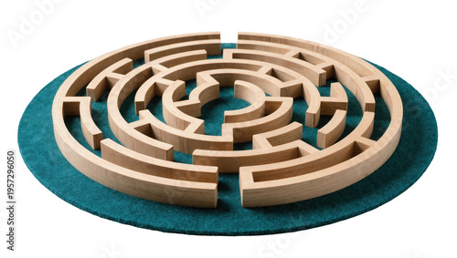 Фотография Intricate wooden circular maze puzzle game with curved walls on a green felt sur