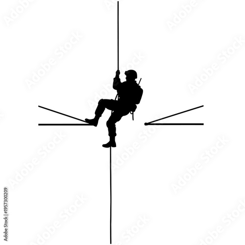 Silhouette of a Soldier Rappelling Down a Rope in Training.